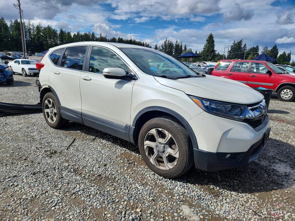 Photo 4 from auction – 2018 HONDA CR-V with VIN 2HKRW2H52JH693532