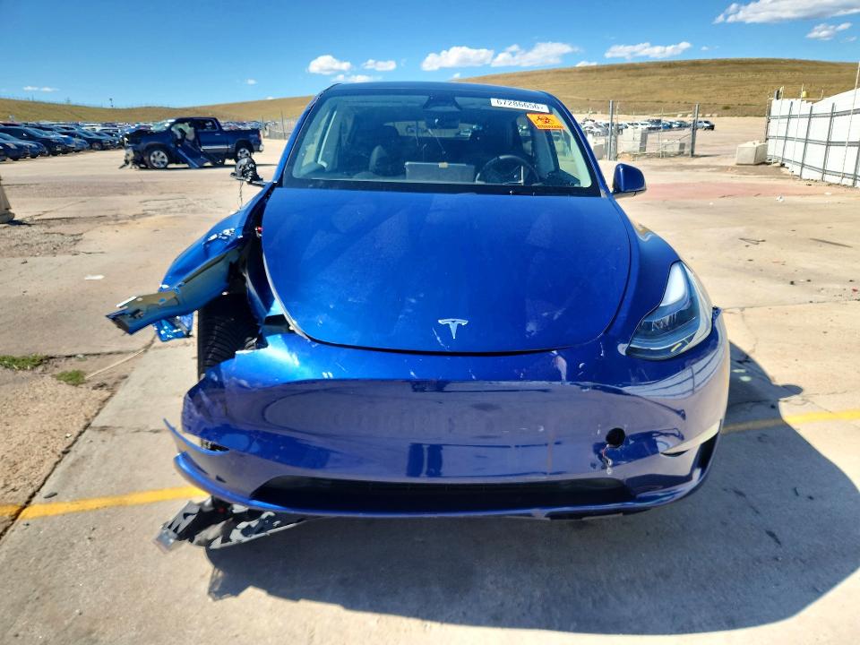 Снимка 5 от търг – 2025 TESLA MODEL Y с VIN 7SAYGDEE2SF237719
