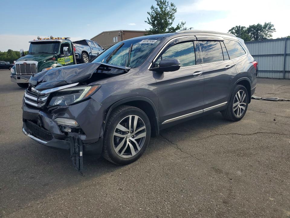 HONDA PILOT 2017 with VIN 5FNYF6H91HB089050 - Photo from auction