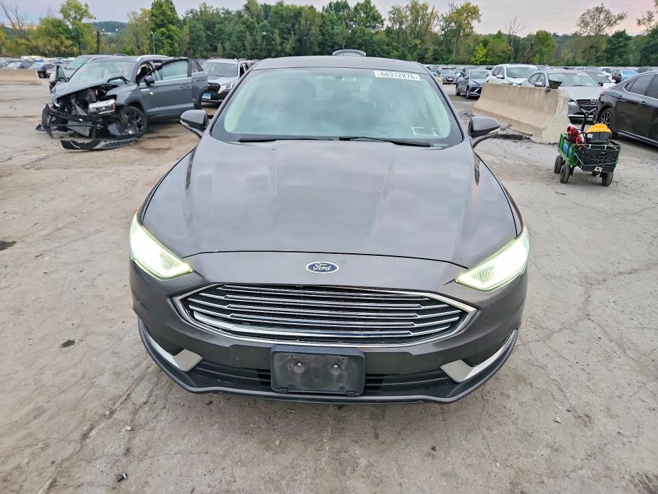 Photo 5 from auction – 2018 FORD FUSION with VIN 3FA6P0T90JR264293