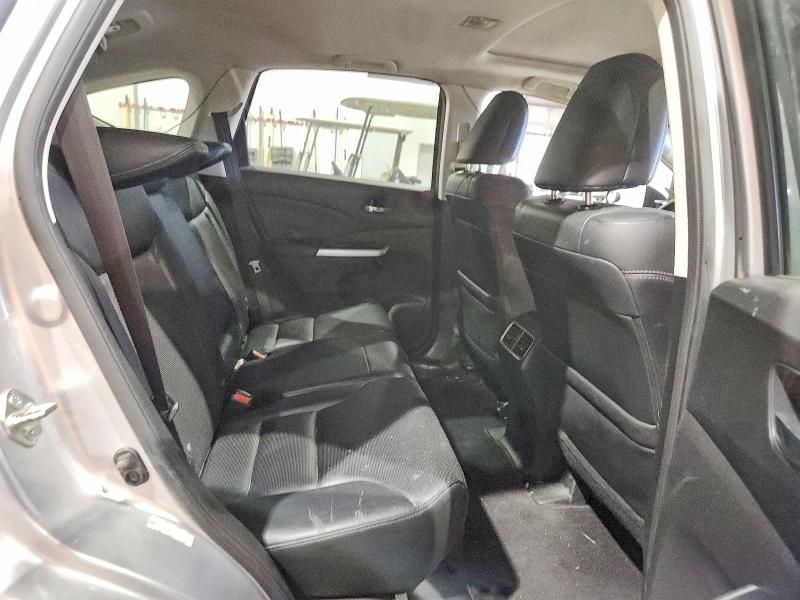 Photo 11 from auction – 2015 HONDA CR-V with VIN 2HKRM4H72FH617934