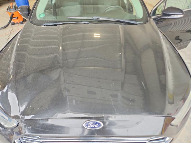 Foto 11 de la subasta – 2014 FORD FUSION con VIN 3FA6P0K96ER336430
