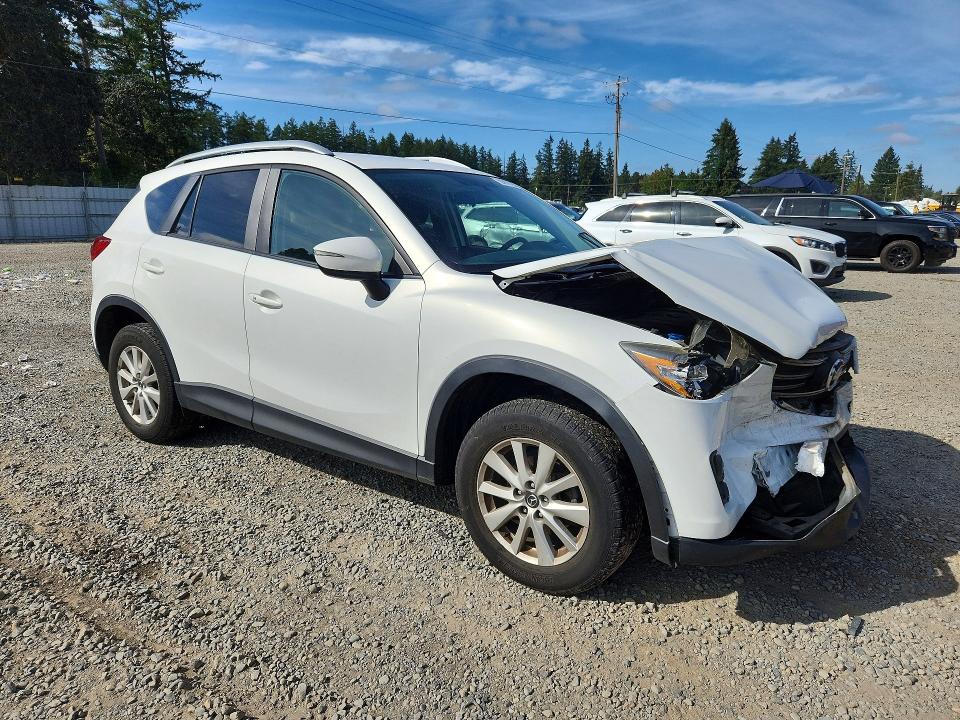 Photo 4 from auction – 2016 MAZDA CX-5 with VIN JM3KE4CY3G0694512