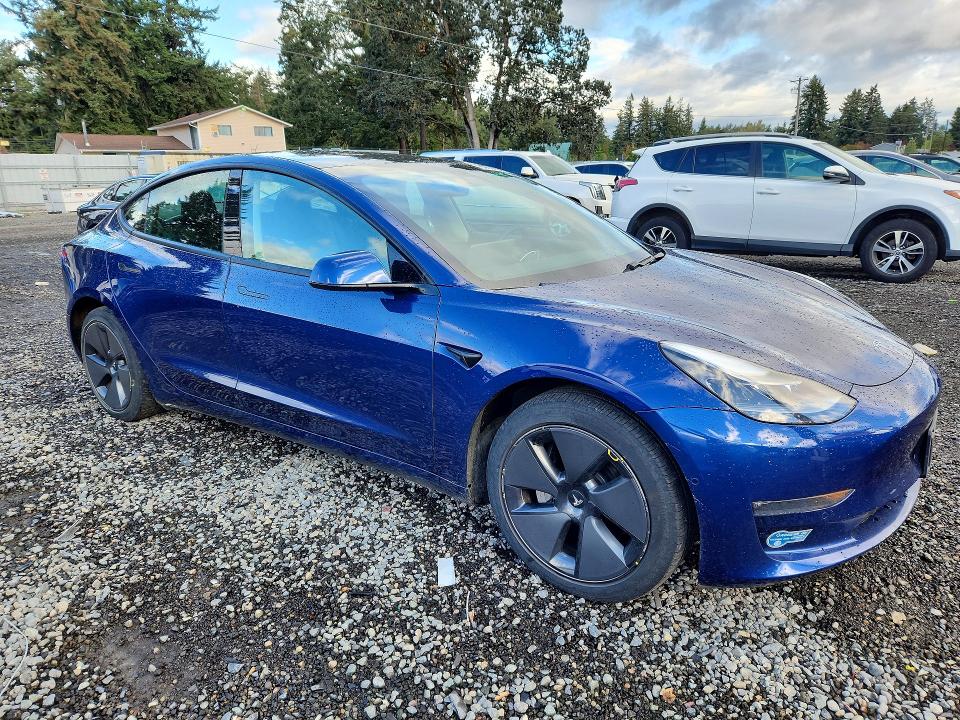 Photo 4 from auction – 2021 TESLA MODEL 3 with VIN 5YJ3E1EB9MF003680