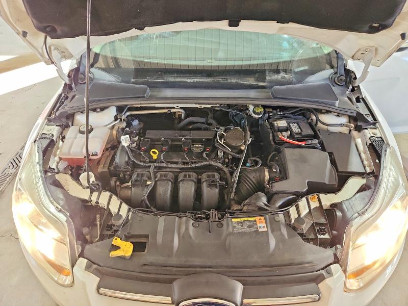 Photo 11 from auction – 2014 FORD FOCUS with VIN 1FADP3F28EL309847