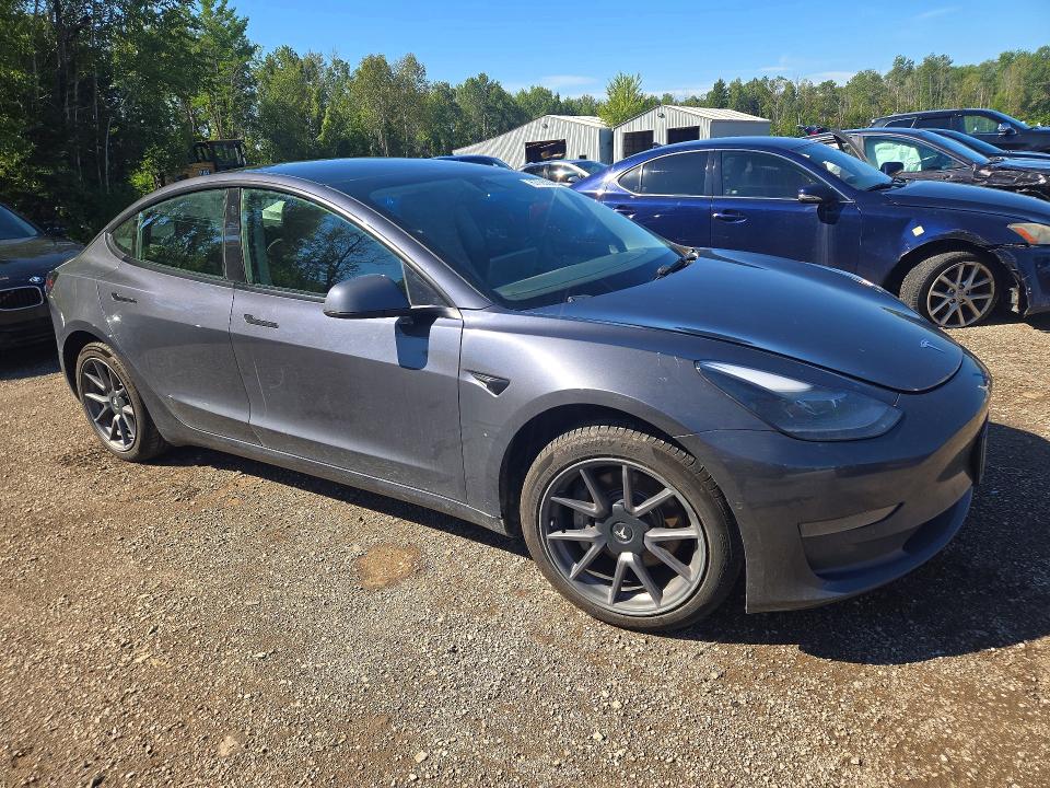 Photo 4 from auction – 2022 TESLA MODEL 3 with VIN 5YJ3E1EA4NF317813