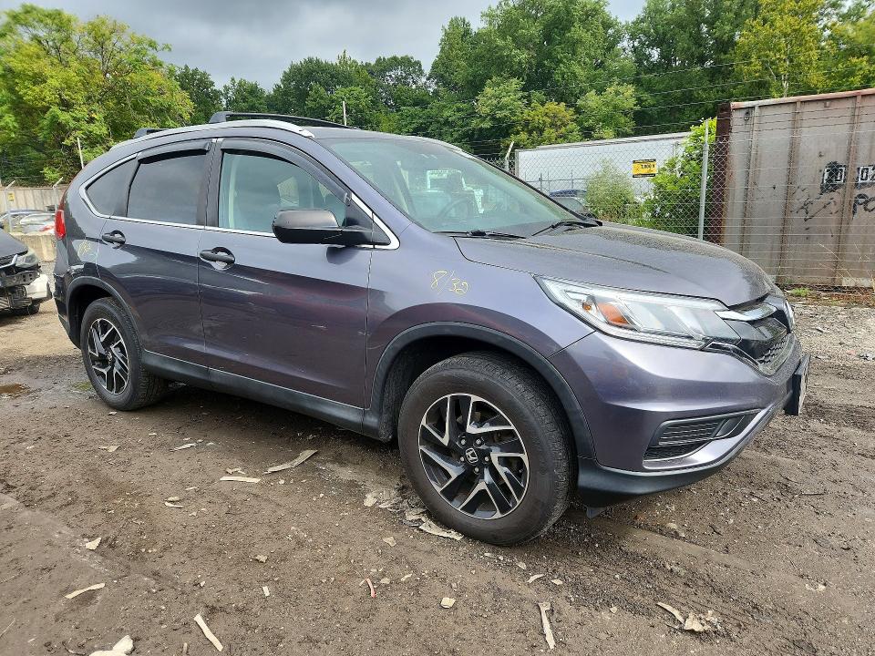 Photo 4 from auction – 2016 HONDA CR-V with VIN 5J6RM4H49GL060033