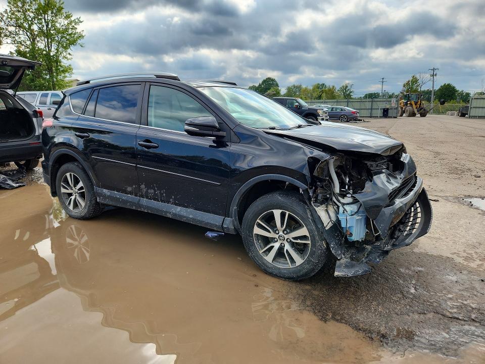 Photo 4 from auction – 2016 TOYOTA RAV4 with VIN 2T3RFREVXGW508853