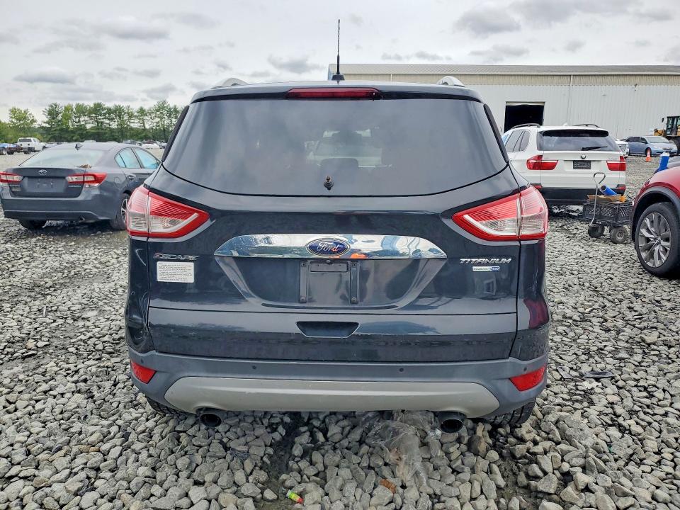 Снимка 6 от търг – 2014 FORD ESCAPE с VIN 1FMCU9J9XEUB53709