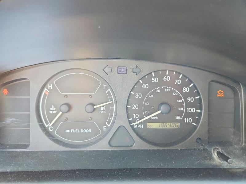 Photo 9 from auction – 1999 TOYOTA COROLLA with VIN 1NXBR12E7XZ154104