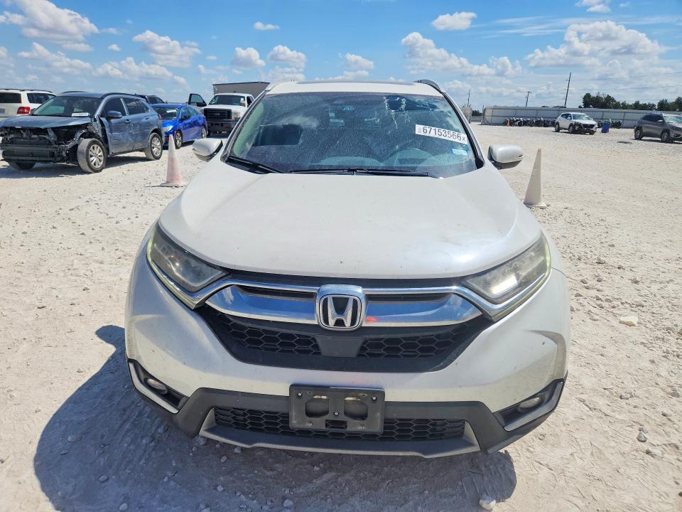 Photo 5 from auction – 2017 HONDA CR-V with VIN 2HKRW1H97HH512688