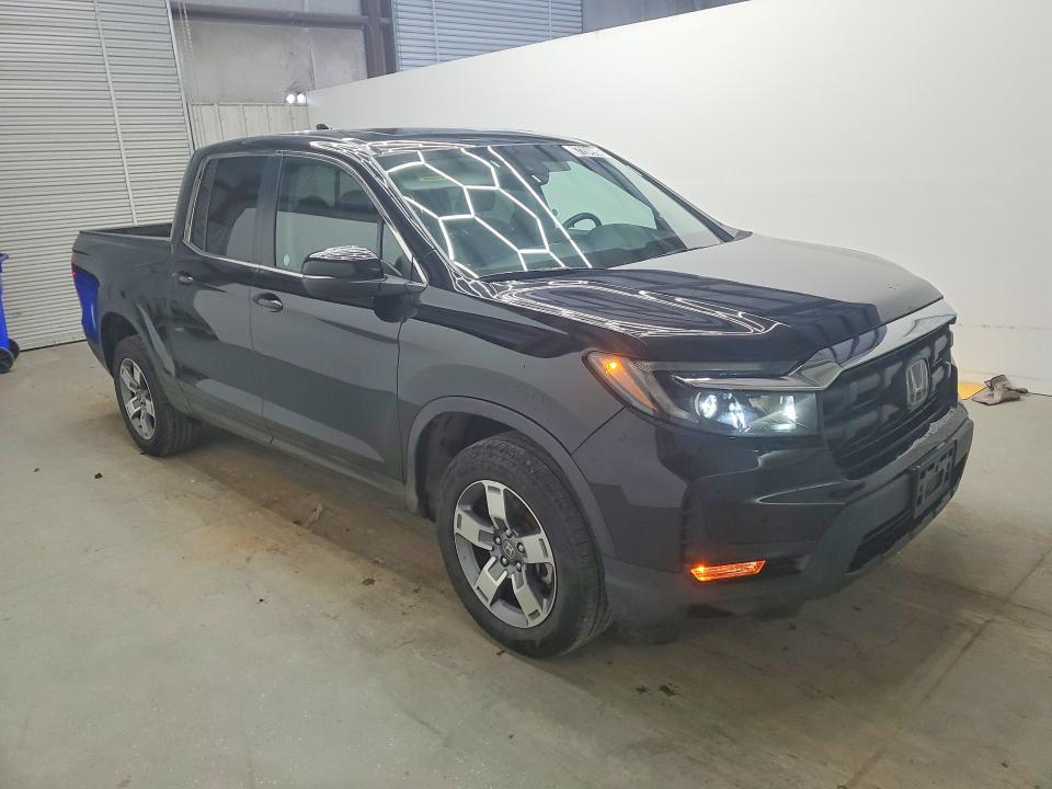 Photo 4 from auction – 2025 HONDA RIDGELINE with VIN 5FPYK3F50SB038616