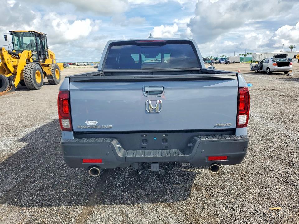 Photo 6 from auction – 2022 HONDA RIDGELINE with VIN 5FPYK3F76NB032387