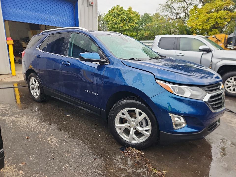 Photo 4 from auction – 2021 CHEVROLET EQUINOX with VIN 3GNAXUEV7ML353279