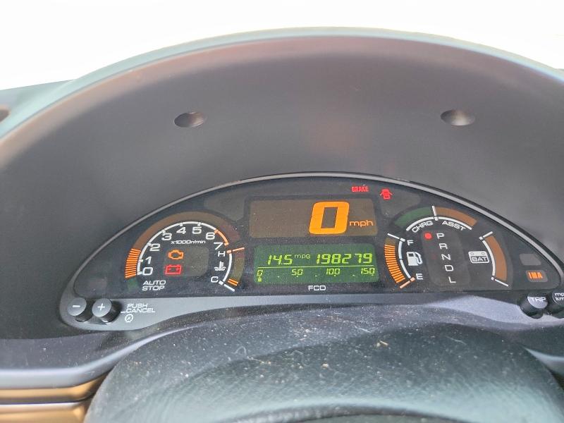 Photo 9 from auction – 2006 HONDA INSIGHT with VIN JHMZE14766S000215