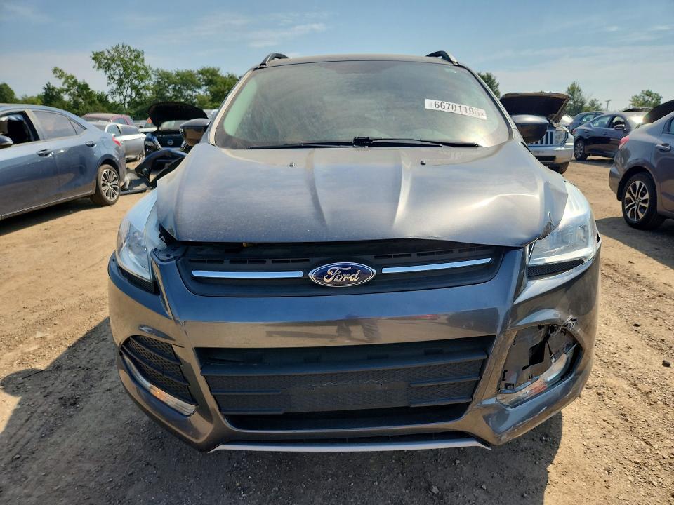 Photo 5 from auction – 2015 FORD ESCAPE with VIN 1FMCU0GX1FUB92093