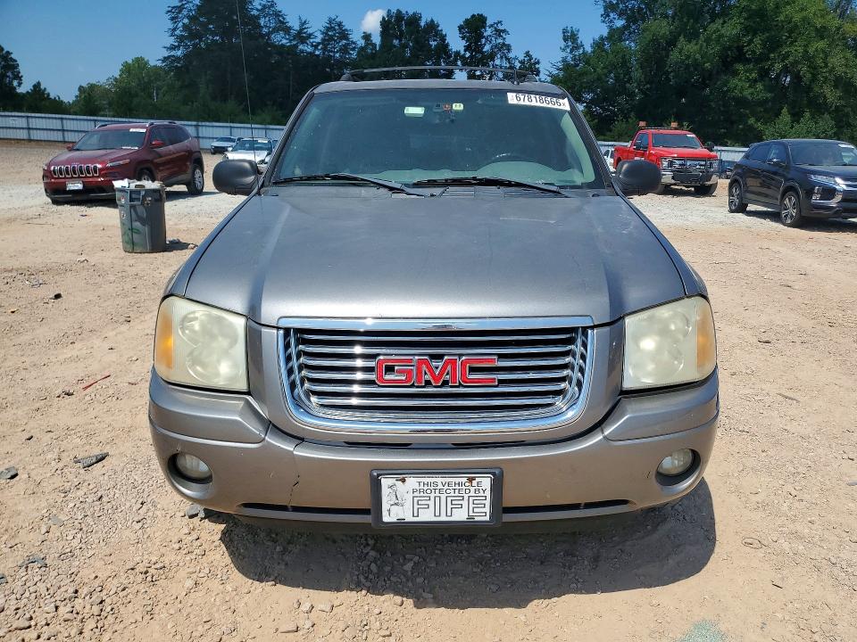 Photo 5 from auction – 2006 GMC ENVOY with VIN 1GKDS13S662244686