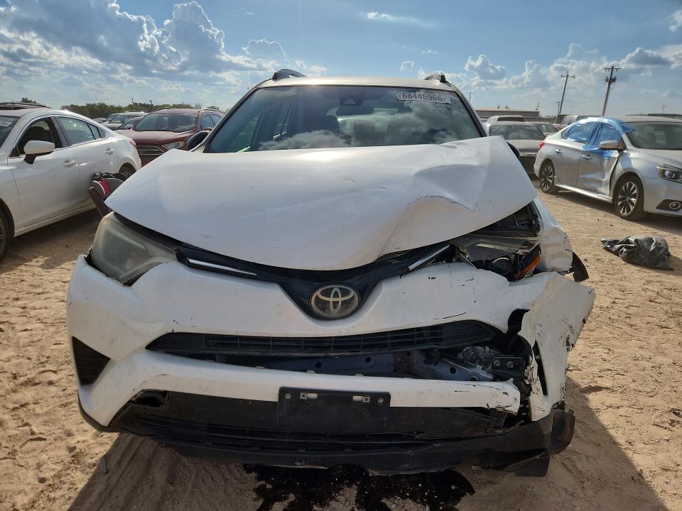 Photo 5 from auction – 2018 TOYOTA RAV4 with VIN JTMZFREV5JJ210278