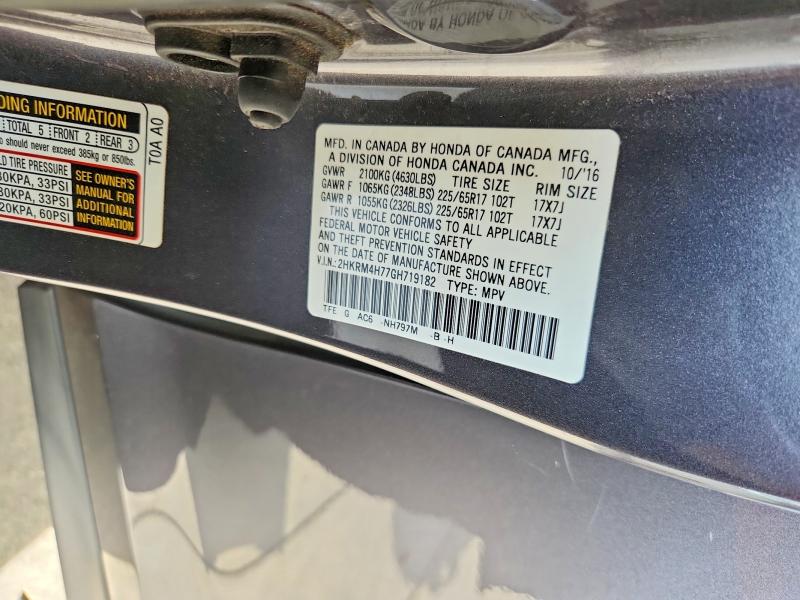 Photo 14 from auction – 2016 HONDA CR-V with VIN 2HKRM4H77GH719182
