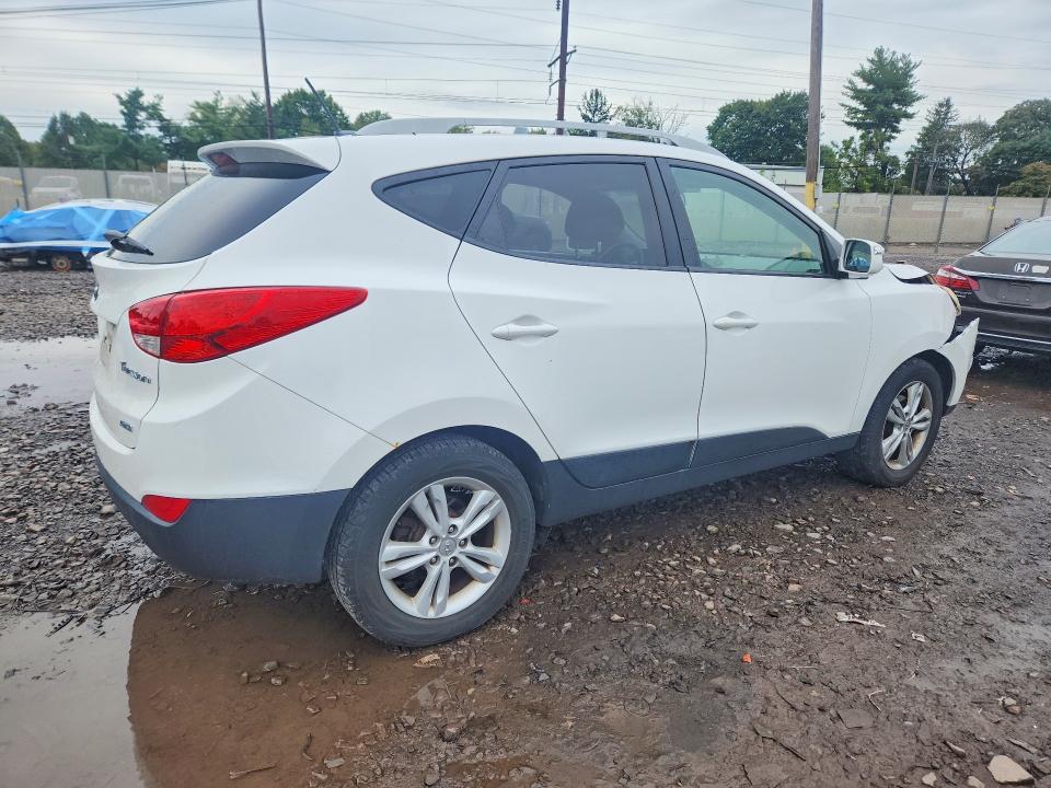 Photo 3 from auction – 2013 HYUNDAI TUCSON with VIN KM8JUCAC3DU753731