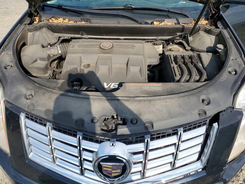 Снимка 12 от търг – 2014 CADILLAC SRX с VIN 3GYFNEE33ES611145