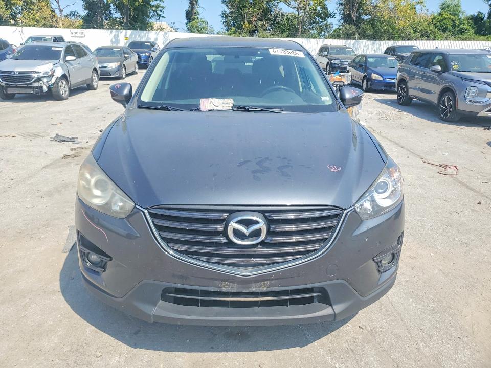 Photo 5 from auction – 2016 MAZDA CX-5 with VIN JM3KE2CYXG0620122
