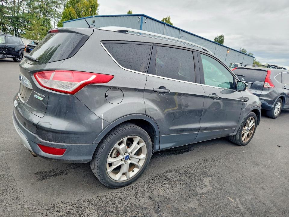 Photo 3 from auction – 2015 FORD ESCAPE with VIN 1FMCU0J95FUA32986