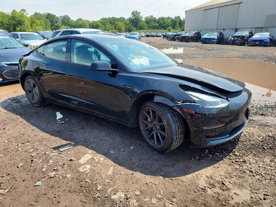 Снимка 4 от търг – 2021 TESLA MODEL 3 с VIN 5YJ3E1EBXMF974834