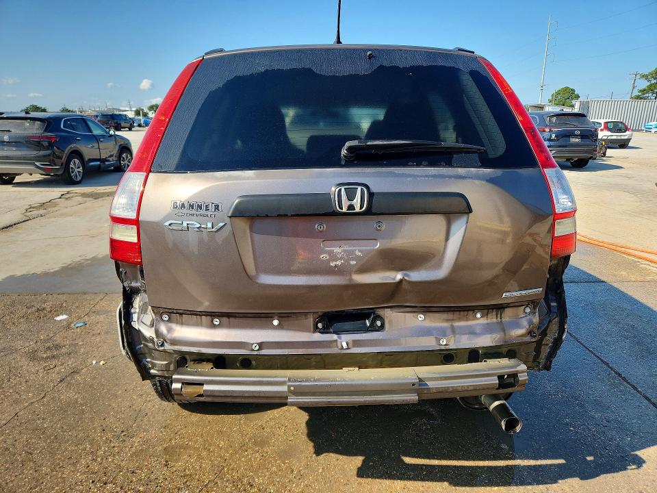 Photo 6 from auction – 2011 HONDA CR-V with VIN 5J6RE3H48BL024446