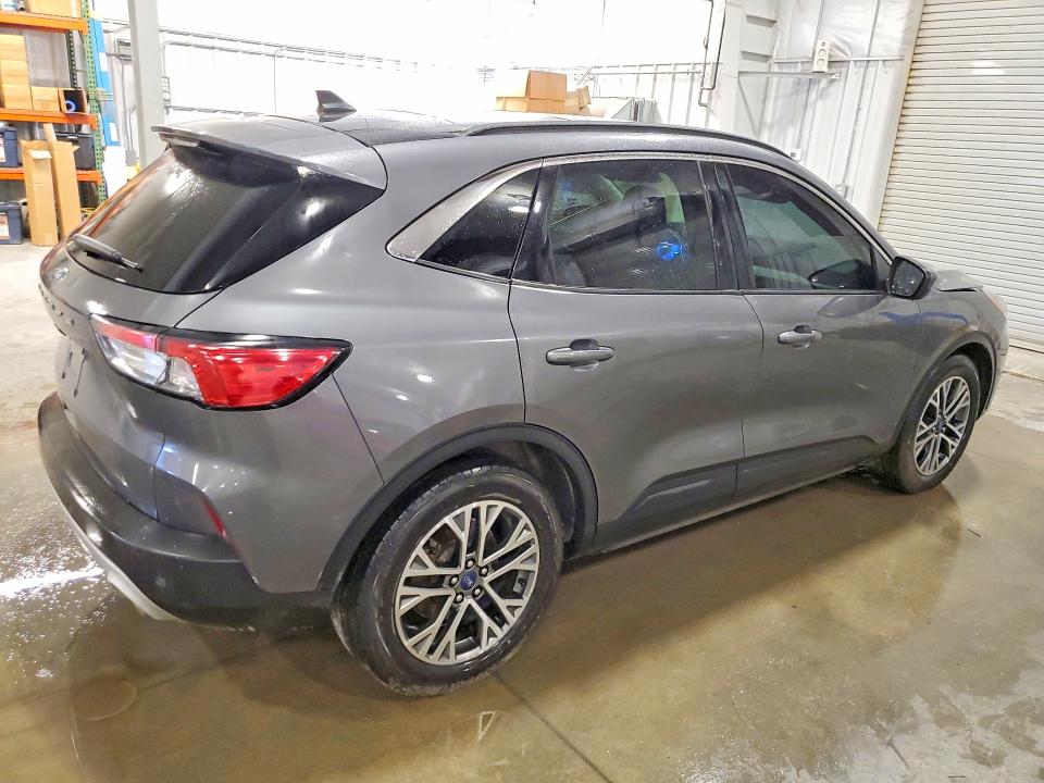 Photo 3 from auction – 2021 FORD ESCAPE with VIN 1FMCU0H64MUA23267