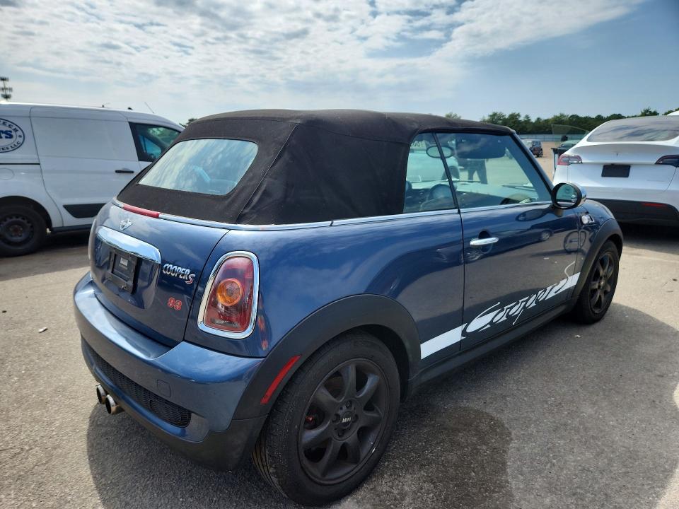 Фото 3 с аукциона – 2009 MINI COOPER с VIN WMWMS33589TY50231