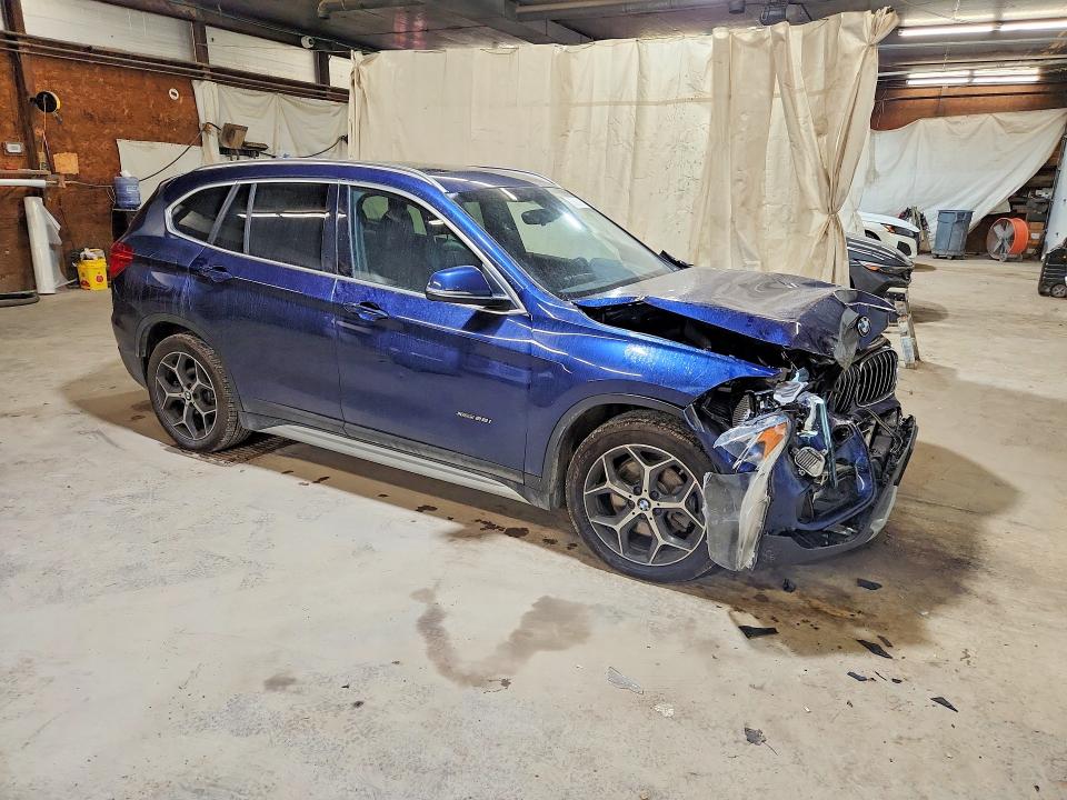 Photo 4 from auction – 2016 BMW X1 with VIN WBXHT3C32GP883105
