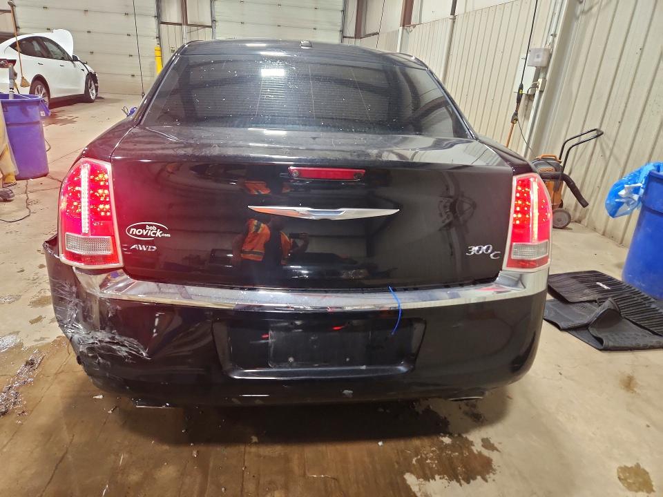 Photo 6 from auction – 2014 CHRYSLER 300C with VIN 2C3CCAKG6EH273293