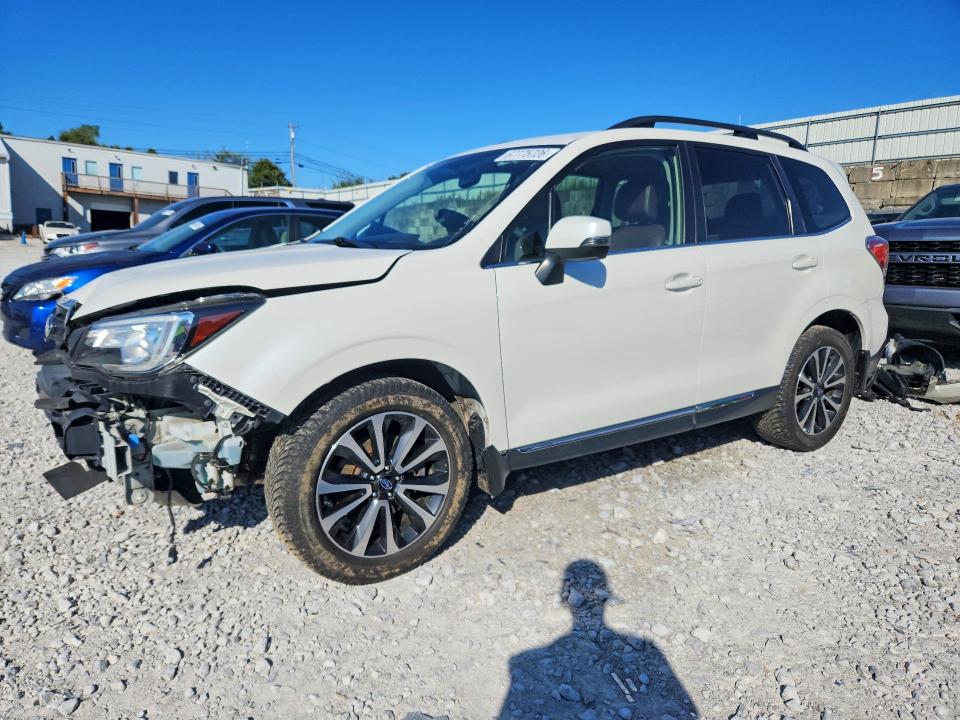 SUBARU FORESTER 2017 with VIN JF2SJGTCXHH406127 - Photo from auction