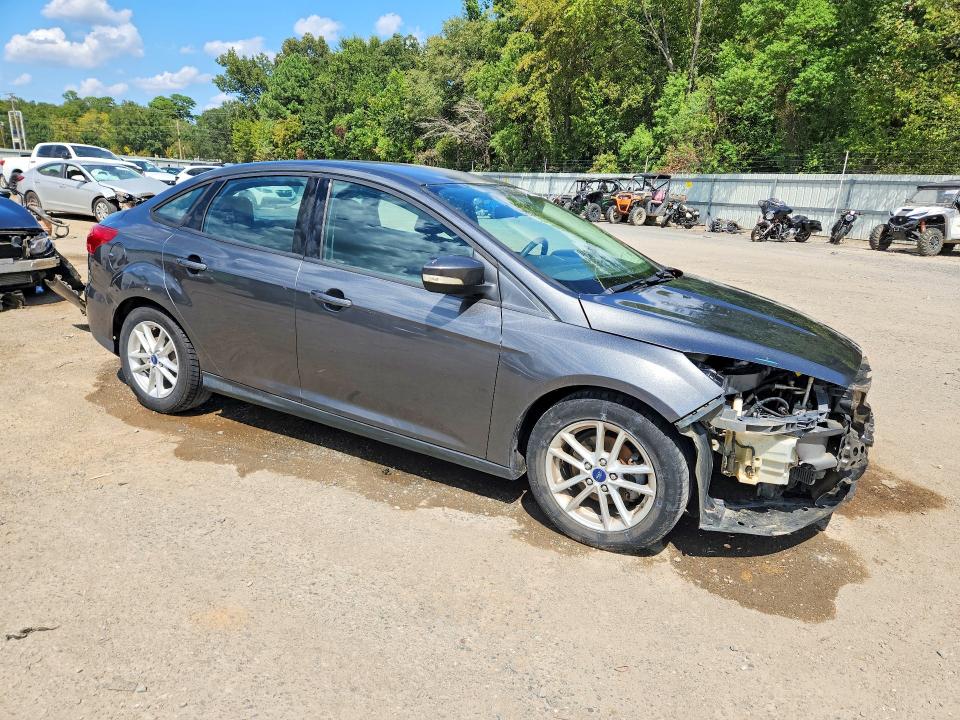Photo 4 from auction – 2016 FORD FOCUS with VIN 1FADP3F22GL374549