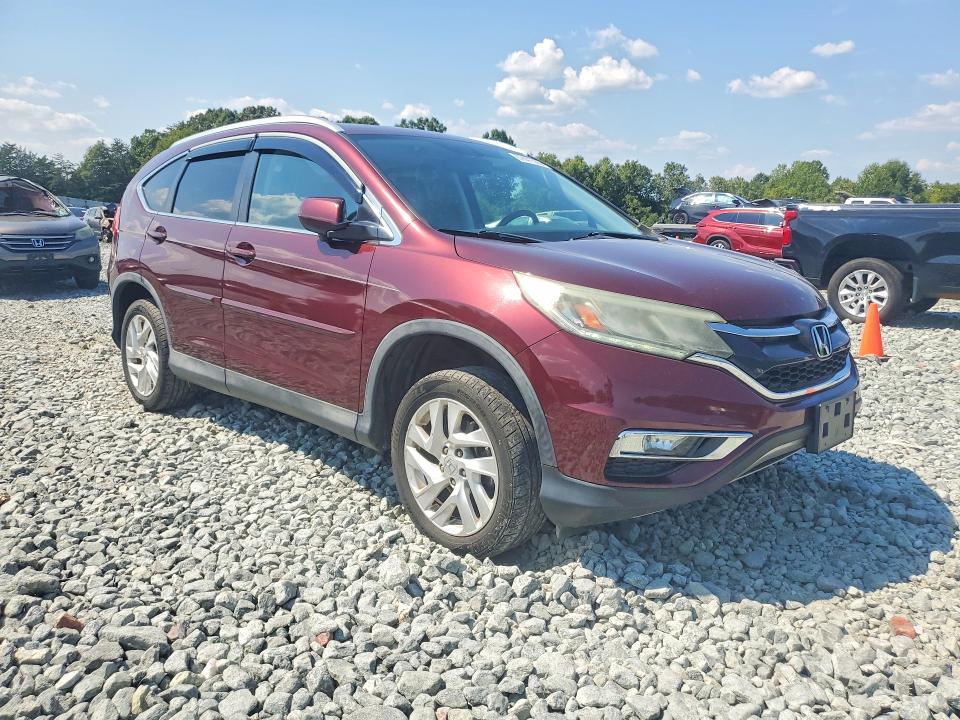 Photo 4 from auction – 2015 HONDA CR-V with VIN 2HKRM3H73FH550108