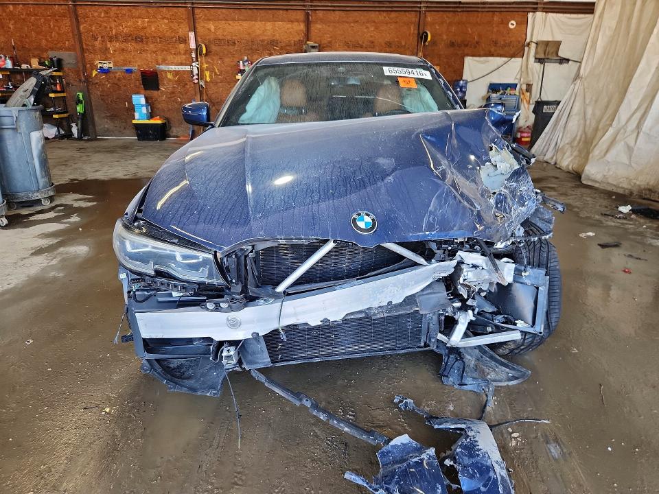 Photo 5 from auction – 2022 BMW 330I with VIN 3MW5R1J0XN8C66037