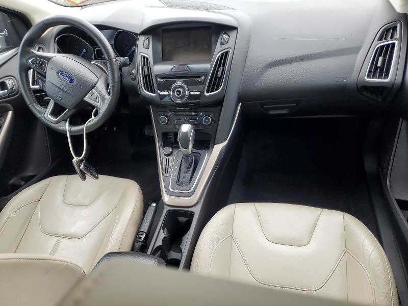 Photo 8 from auction – 2015 FORD FOCUS with VIN 1FADP3J25FL340529