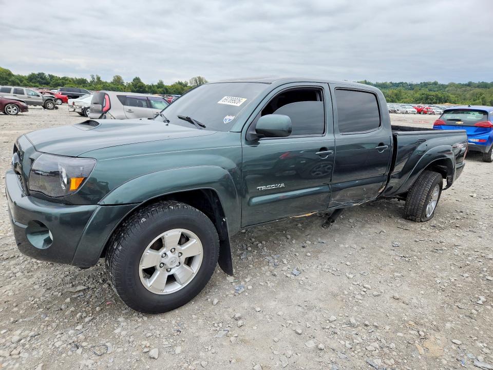 TOYOTA TACOMA 2011 с VIN 3TMMU4FN1BM034027 - Снимка от търг