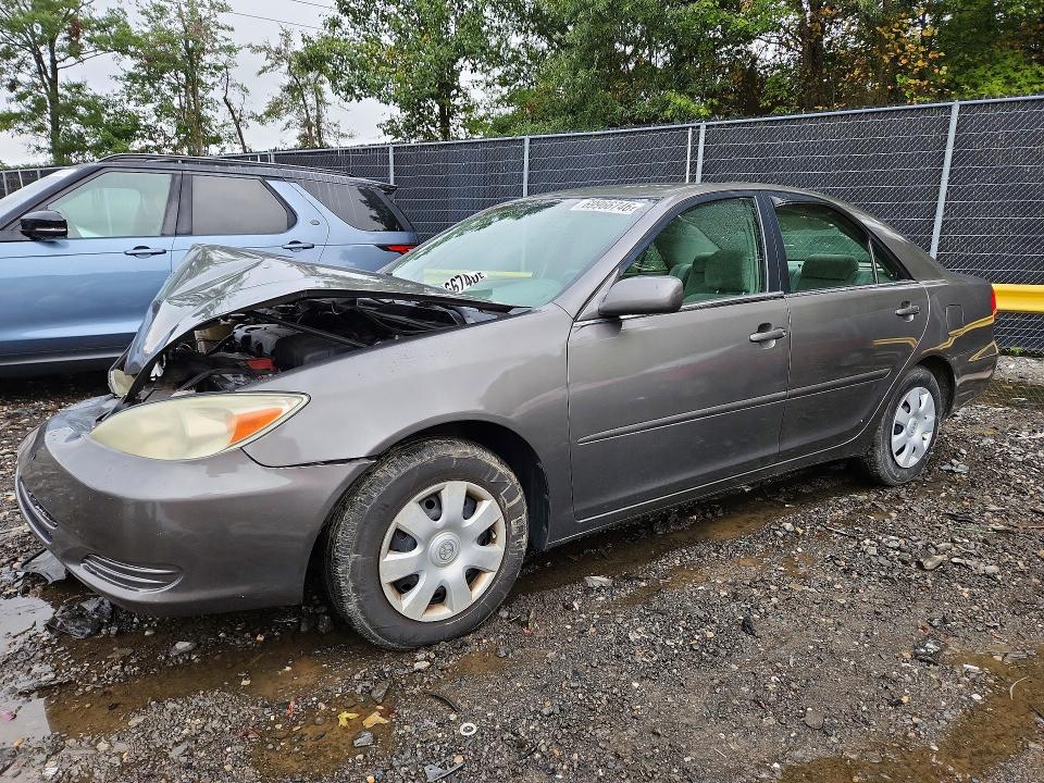 TOYOTA CAMRY 2004 with VIN 4T1BE32KX4U858516 - Photo from auction