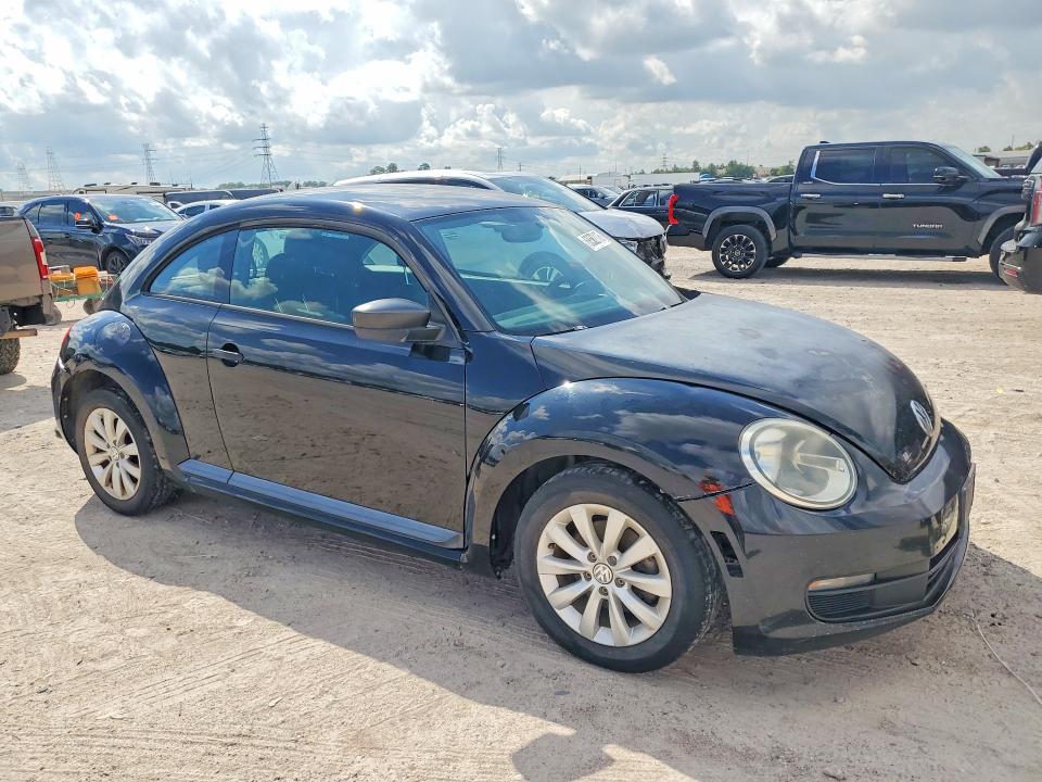 Photo 4 from auction – 2013 VOLKSWAGEN BEETLE with VIN 3VWFP7AT0DM659350