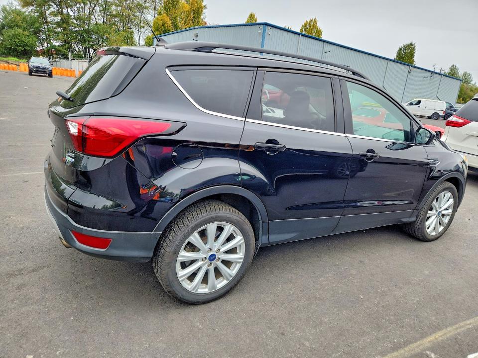 Photo 3 from auction – 2019 FORD ESCAPE with VIN 1FMCU9HD3KUB29063