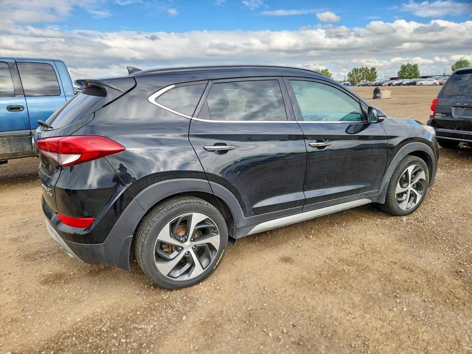 Photo 3 from auction – 2017 HYUNDAI TUCSON with VIN KM8J3CA29HU352880