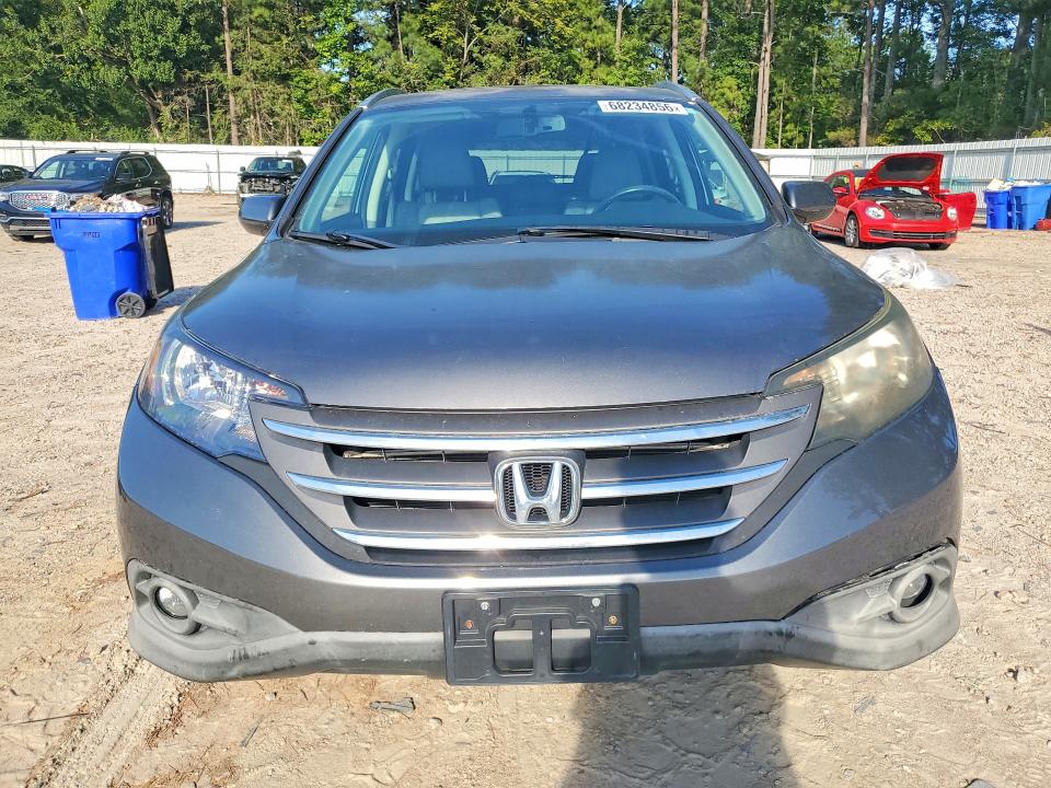 Photo 5 from auction – 2014 HONDA CR-V with VIN 2HKRM3H71EH500239