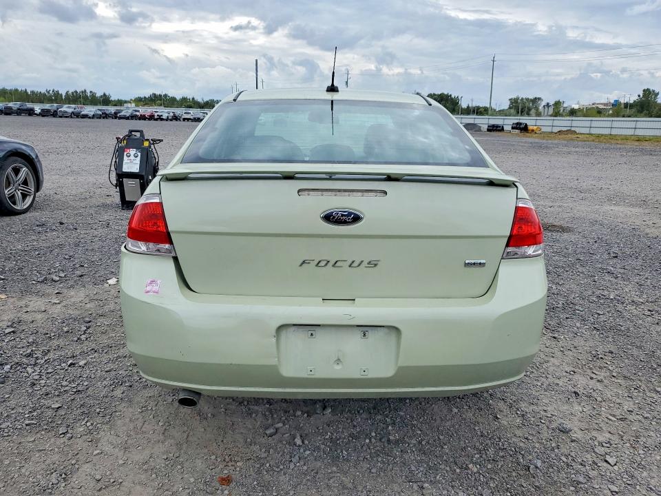 Снимка 6 от търг – 2010 FORD FOCUS с VIN 1FAHP3HN2AW215979