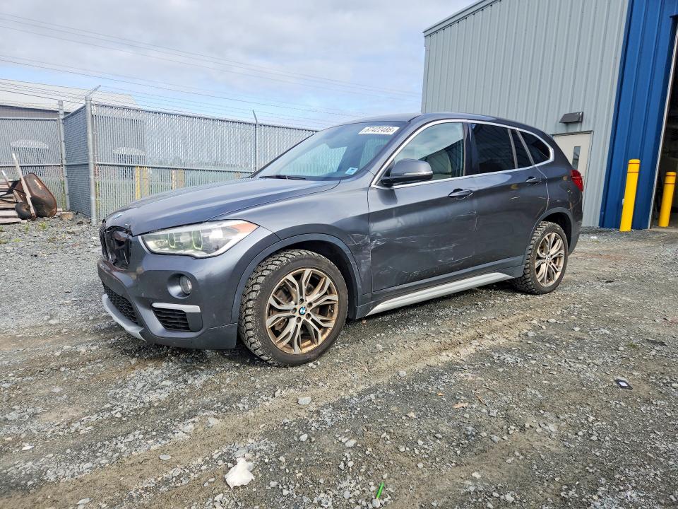 BMW X1 2018 with VIN WBXHT3C33J5L26903 - Photo from auction