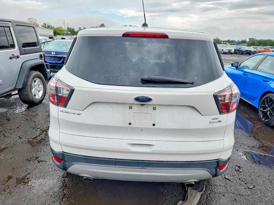 Photo 6 from auction – 2017 FORD ESCAPE with VIN 1FMCU9GD1HUB19044