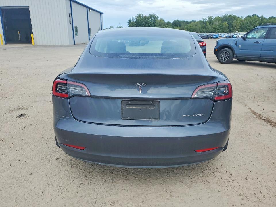 Снимка 6 от търг – 2021 TESLA MODEL 3 с VIN 5YJ3E1EB8MF019434