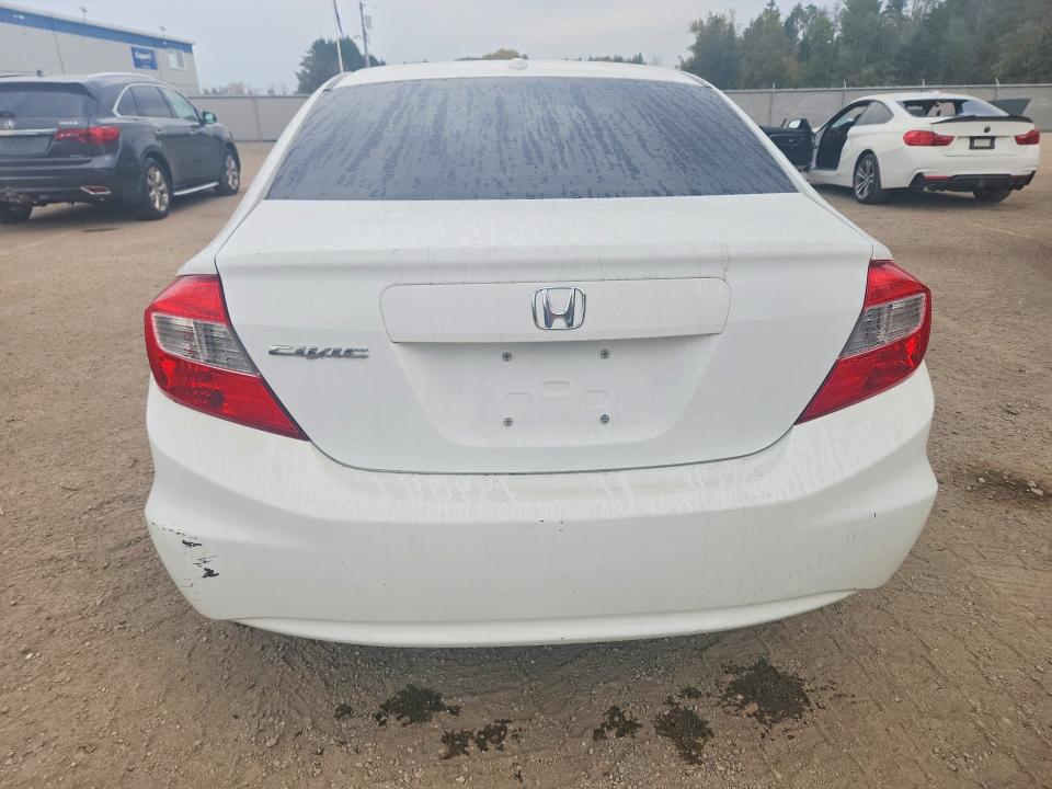 Снимка 6 от търг – 2012 HONDA CIVIC с VIN 2HGFB2F96CH120831