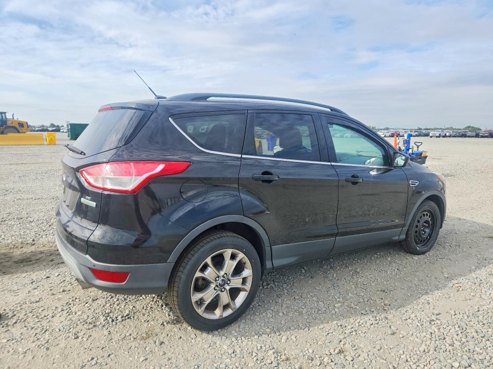 Photo 3 from auction – 2016 FORD ESCAPE with VIN 1FMCU0GX1GUB14382